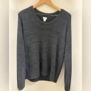 Stars above grey sweater